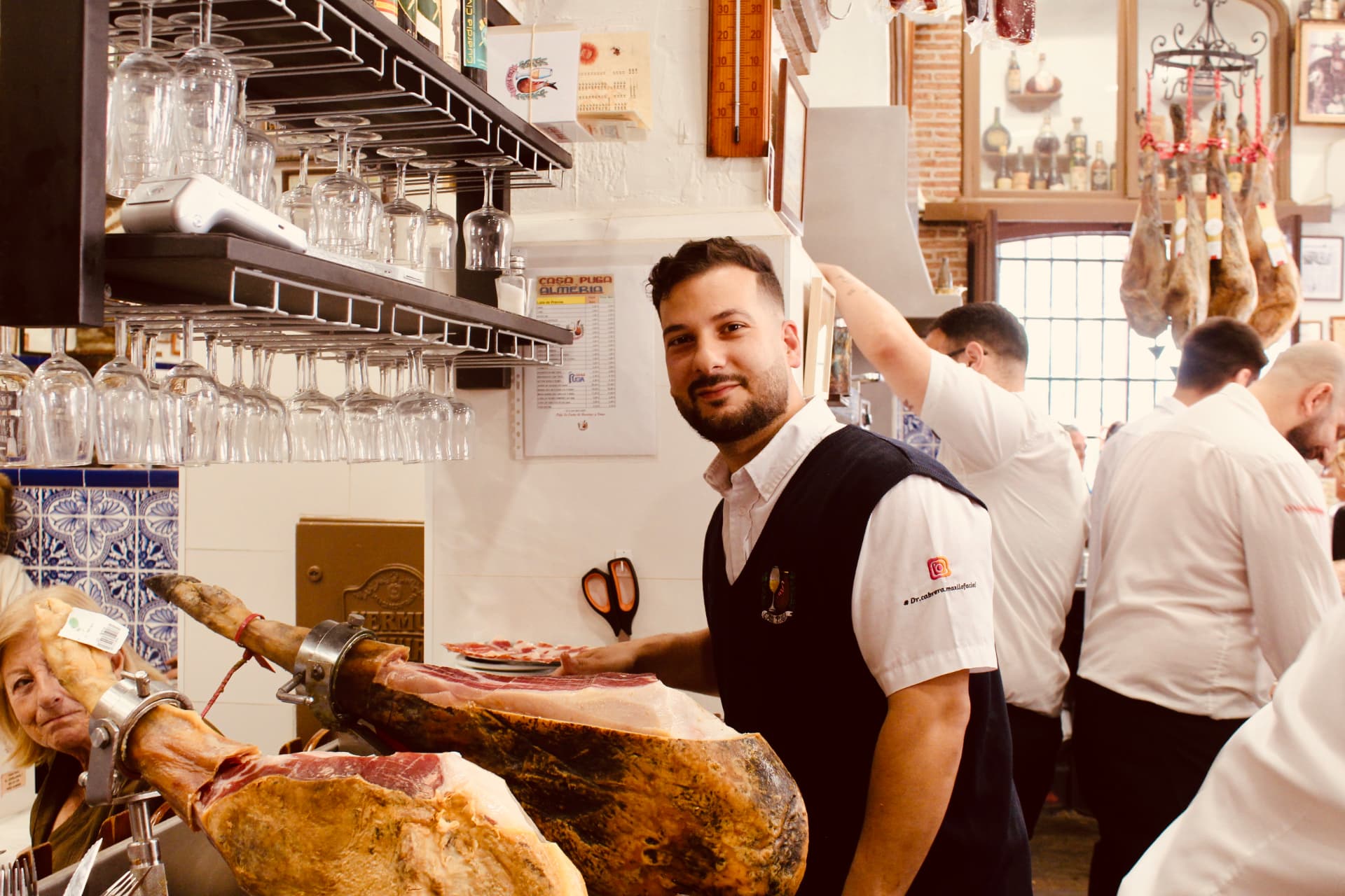 Jamón being carved at the bar in Almería